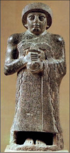 Άγαλμα του Γουδέα, ηγεμόνα σουμερικής πόλης.(Παρίσι, Μουσείο Λούβρου)