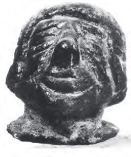 Ζύγι σε σχήμα ανθρώπινης κεφαλής, από την Ουγκαρίτ. Η χρησιμοποίηση μέτρων βάρους ήταν μια απαραίτητη προϋπόθεση στις εμπορικές συναλλαγές των Φοινίκων.