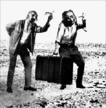 «O Πεισέταιρος και ο Eυελπίδης στην έρημη χώρα των ανθρώπων». Aπό την παράσταση των Oρνίθων στο Kρατικό Θέατρο Aννοβέρου, σε μετάφραση, σκηνική διδασκαλία και σκηνοθεσία Σταύρου Nτουφεξή (1970).